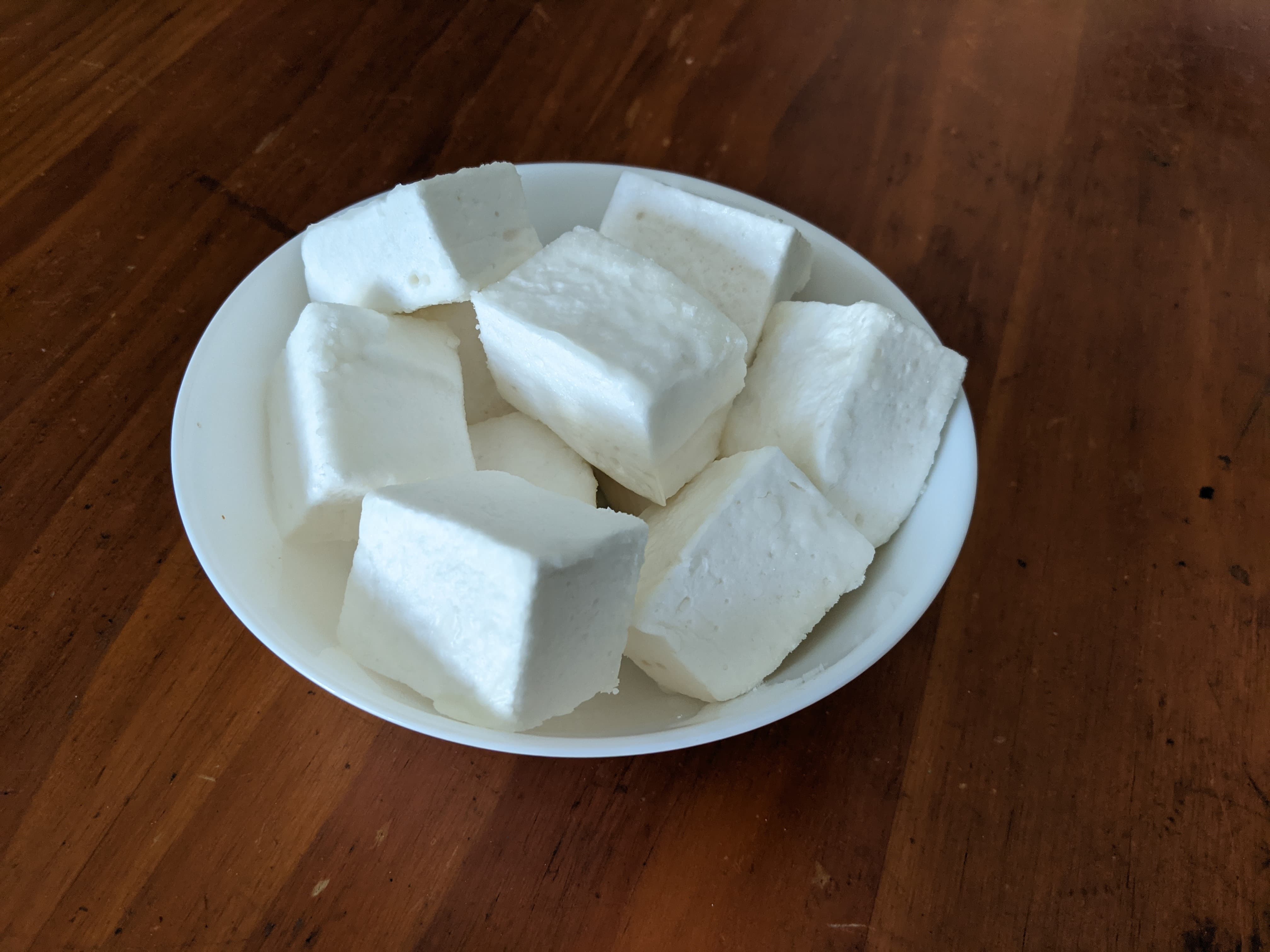 Cubes of white marshmallow in a bowl